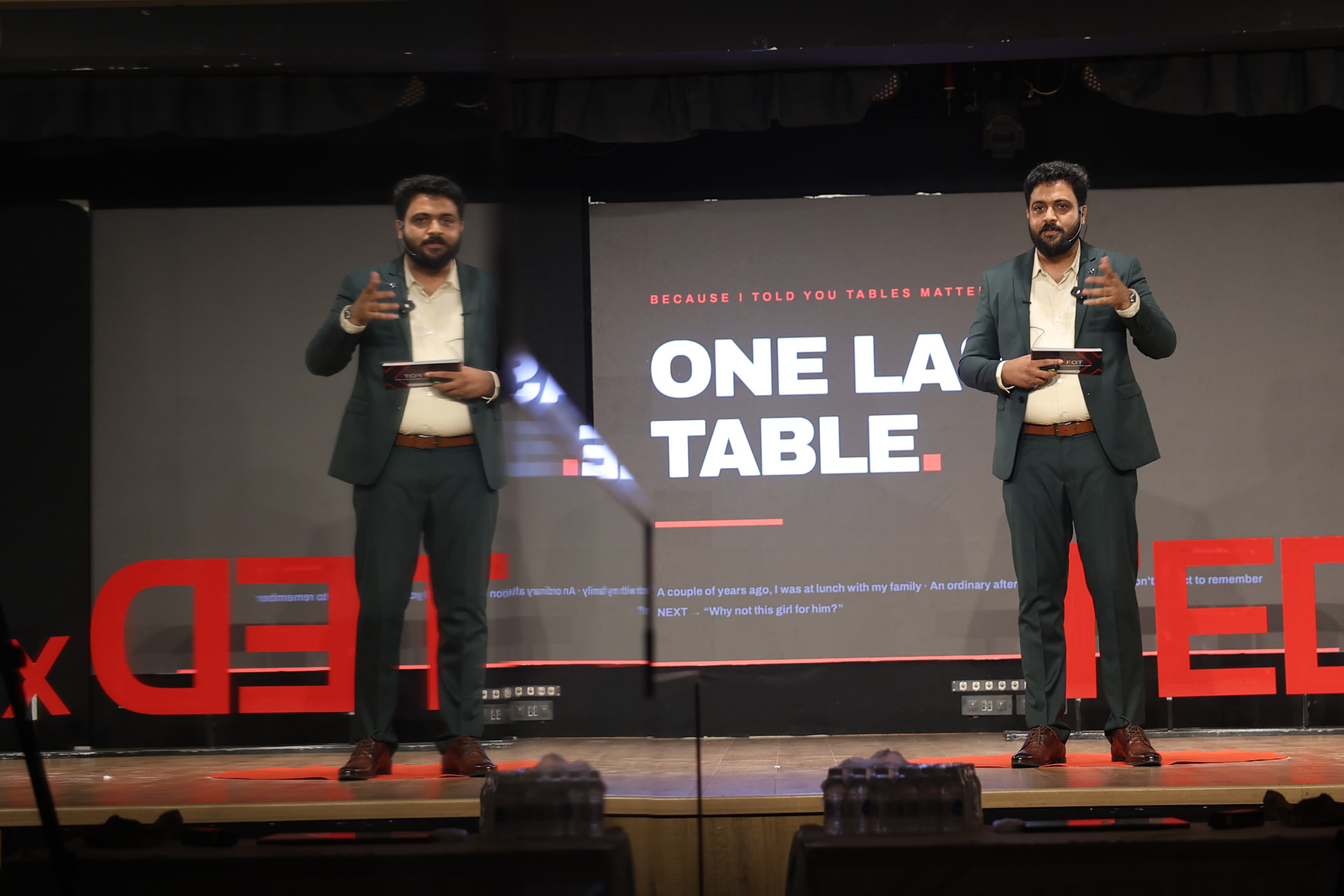 Dr.Nizamudheen Valliyattu speaking on stage